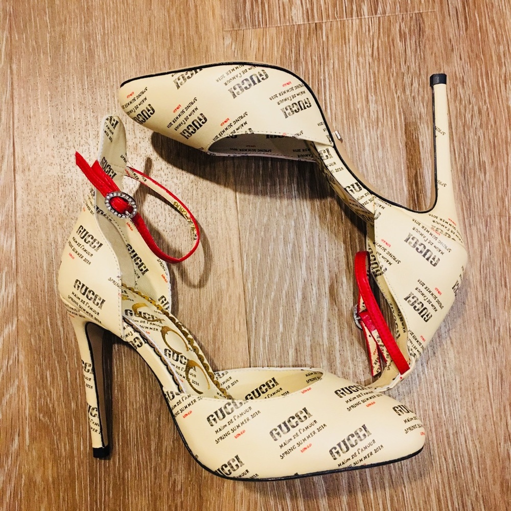 Gucci tan printed leather heels.